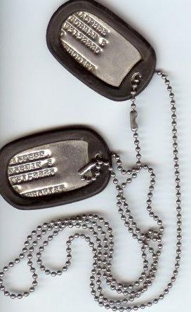 Dog tags: Norm MacPhee Dog tags: Norm MacPhee