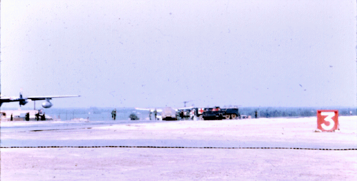 Bill Hooper landing to receive medical attention after being severely wounded inflight. Photo courtesy Jim Lawrence Bill Hooper landing to receive medical attention after being severely wounded inflight. Photo courtesy Jim Lawrence