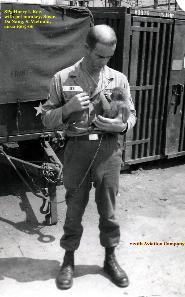 SP5 Harry I. Kee with a pet monkey named Susie SP5 Harry I. Kee with a pet monkey named Susie