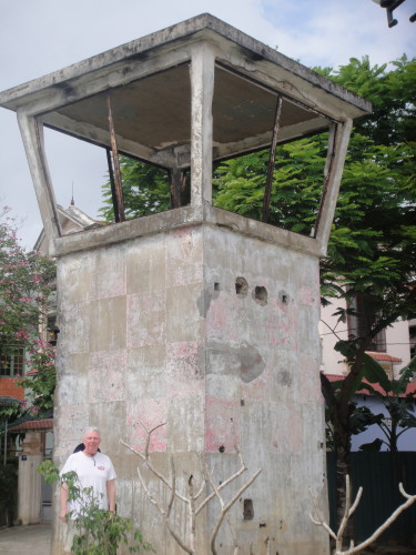 Close-up view of tower. Notice the bullet holes Close-up view of tower. Notice the bullet holes